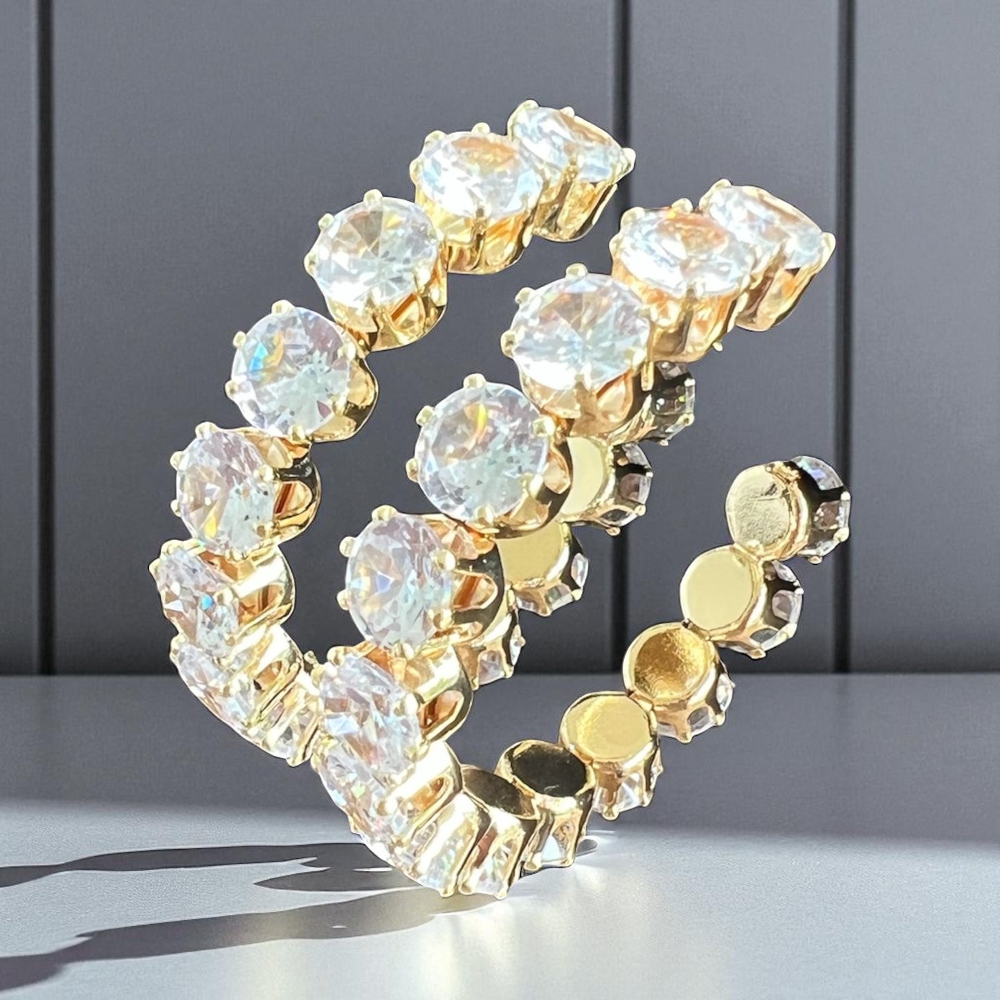 Radiant Twist Hoops